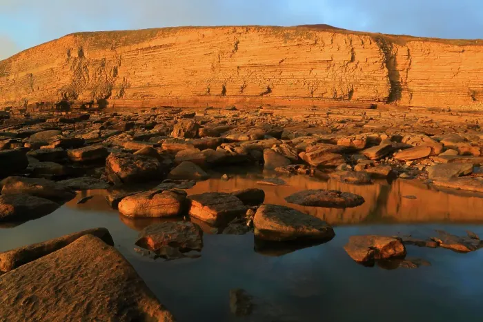 Framed Print : Golden evening light on the cliffs in winter at Dunraven Bay, Southerndown, Bridgend, South Wales, United Kingdom Framed Print : Golden evening light on the cliffs in winter at Dunraven Bay, Southerndown, Bridgend, South Wales, United Kingdom