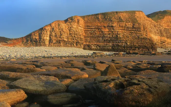 Framed Print : Golden evening light on the cliffs in winter at Dunraven Bay, Southerndown, Bridgend, South Wales, United Kingdom Framed Print : Golden evening light on the cliffs in winter at Dunraven Bay, Southerndown, Bridgend, South Wales, United Kingdom