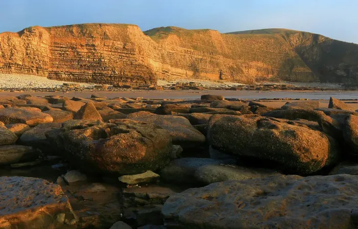 Framed Print : Golden evening light on the cliffs in winter at Dunraven Bay, Southerndown, Bridgend, South Wales, United Kingdom Framed Print : Golden evening light on the cliffs in winter at Dunraven Bay, Southerndown, Bridgend, South Wales, United Kingdom