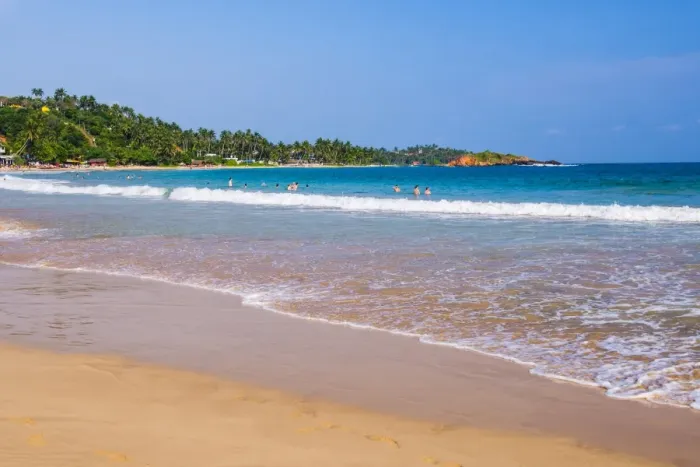 Framed Print : Golden sands and blue waters of the Indian Ocean at Mirissa Beach, South Coast, Sri Lanka, Asia Framed Print : Golden sands and blue waters of the Indian Ocean at Mirissa Beach, South Coast, Sri Lanka, Asia