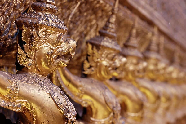 Golden sculptures of Garuda and Naga, Wat Phra Kaew (Temple of the Emerald Buddha), Bangkok, Thailand, Southeast Asia, Asia