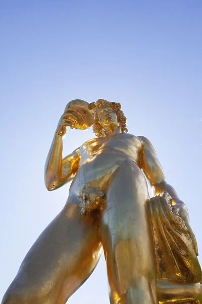 Golden statue on the Grand Cascade at Peterhof Palace, St. Petersburg, Russia, Europe