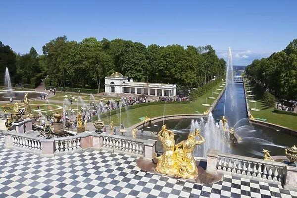 Golden statues and fountains of the Grand Cascade at Peterhof Palace with the Marine Canal, St. Petersburg, Russia, Europe