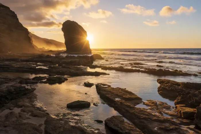 Framed Print : Golden sunset over the giant monolith of Roque Del Moro, Cofete beach, Jandia Nature Park