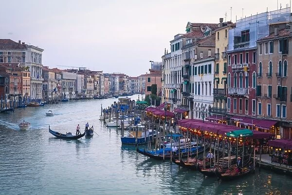 A gondola crossing the Grand Canal, Venice, UNESCO World Heritage Site, Veneto, Italy, Europe