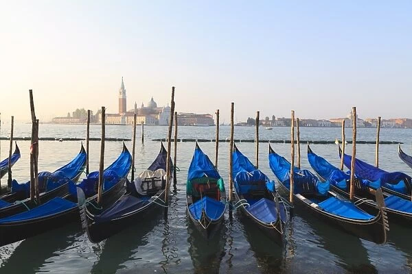 Gondolas on the Lagoon, San Giorgio Maggiore in the distance, Venice, UNESCO World Heritage Site