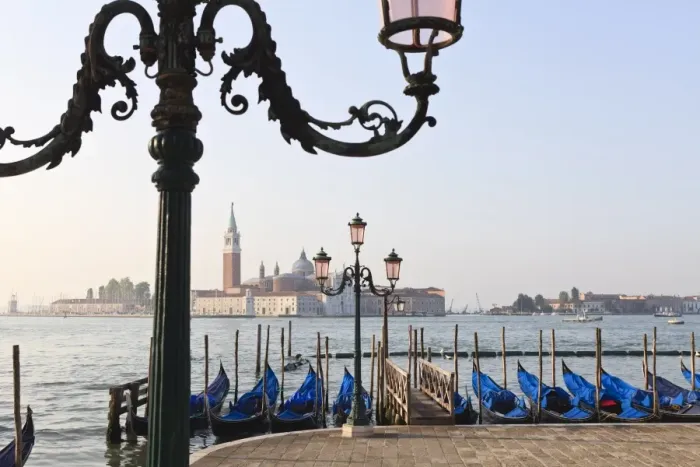 Framed Print : Gondolas moored on the Lagoon, San Giorgio Maggiore beyond, Riva degli Schiavoni Framed Print : Gondolas moored on the Lagoon, San Giorgio Maggiore beyond, Riva degli Schiavoni