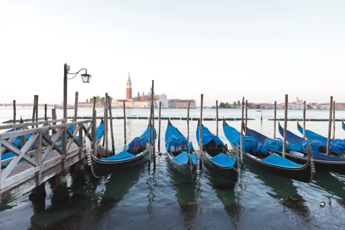 Framed Print : Gondolas moored on the Lagoon, San Giorgio Maggiore beyond, Riva degli Schiavoni Framed Print : Gondolas moored on the Lagoon, San Giorgio Maggiore beyond, Riva degli Schiavoni