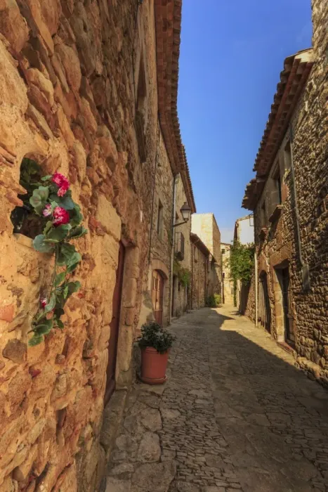 Framed Print : Gorgeous medieval village, cobblestone narrow lane and flowers, Peratallada, Baix Emporda Framed Print : Gorgeous medieval village, cobblestone narrow lane and flowers, Peratallada, Baix Emporda