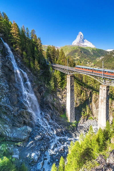 Gornergrat Bahn train on viaduct with Matterhorn in the background, Zermatt, canton of Valais