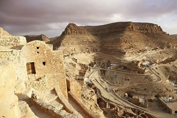 Granaries (ghorfas) and troglodyte dwellings at hillside Berber village of Chenini