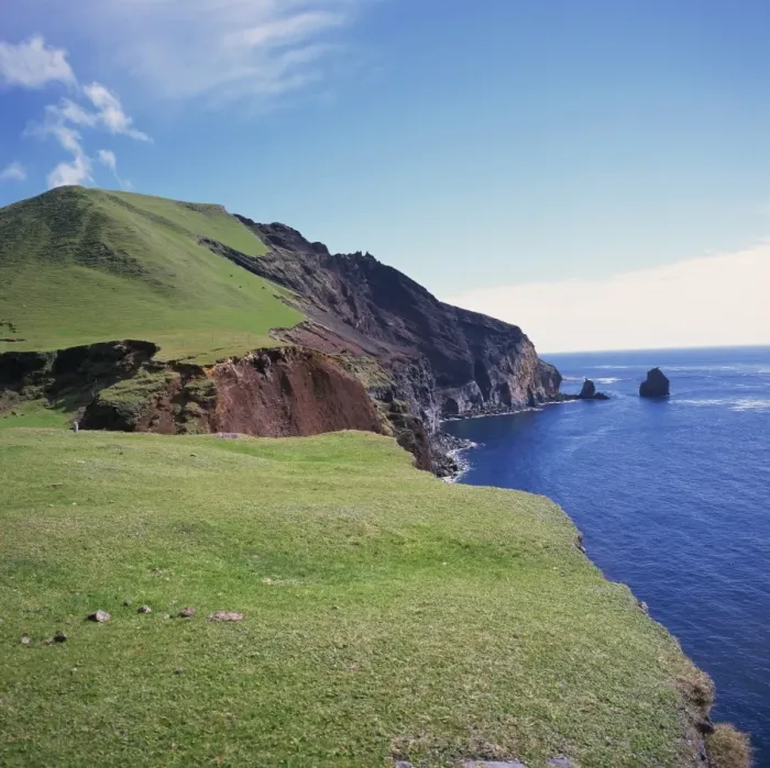 Framed Print : Grass topped cliffs along the north west coast between Framed Print : Grass topped cliffs along the north west coast between