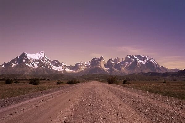 Gravel road and Cuernos del Paine, Torres del Paine National Park, Patagonia