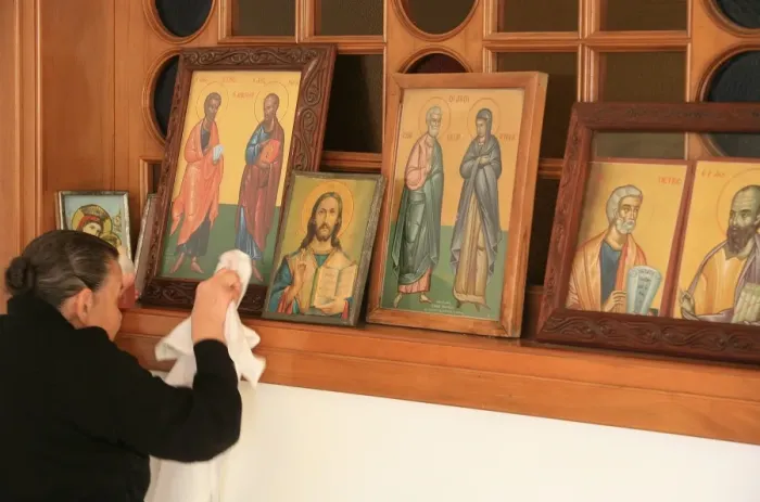 Framed Print : Greek Orthodox woman cleaning icons, Thessaloniki, Macedonia, Greece, Europe