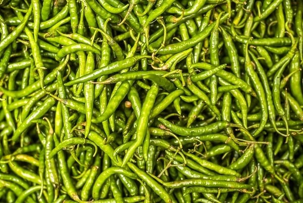 Green chillies for sale in Mapusa Market, Goa, India, Asia