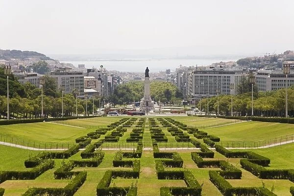 The greenery of the Parque Eduard VII runs towards the Marques de Pombal memorial in central Lisbon
