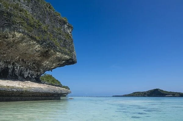 The grey Lekiny cliffs, Ouvea, Loyalty Islands, New Caledonia, Pacific