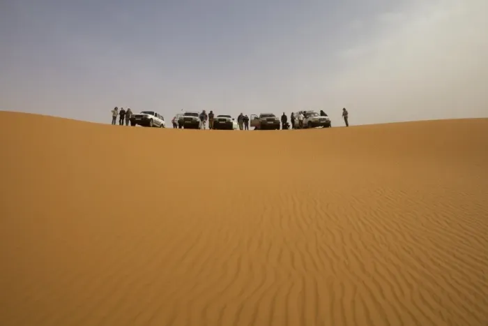 Framed Print : A group of 4x4 vehicles in the dunes of the erg of Murzuk in the Fezzan desert Framed Print : A group of 4x4 vehicles in the dunes of the erg of Murzuk in the Fezzan desert
