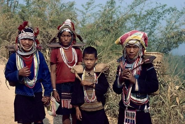 Group from the Aka (Akha) Hill Tribe in traditional dress