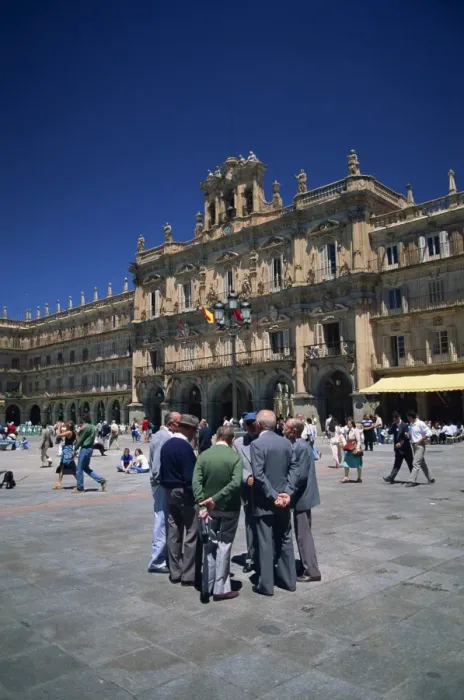 Framed Print : A group of men talking in front of the town hall in the Plaza Mayor Framed Print : A group of men talking in front of the town hall in the Plaza Mayor