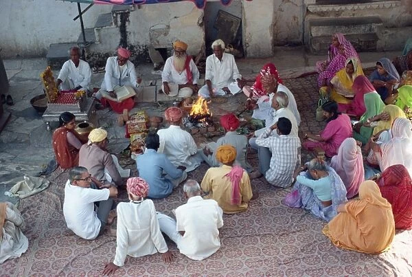 Group reading of the Holy Book at a Hindu meeting