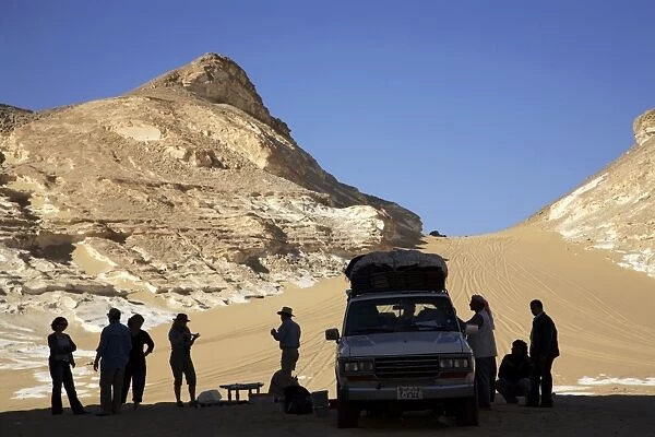 Group of travellers visiting the Black Desert, Egypt, North Africa, Africa