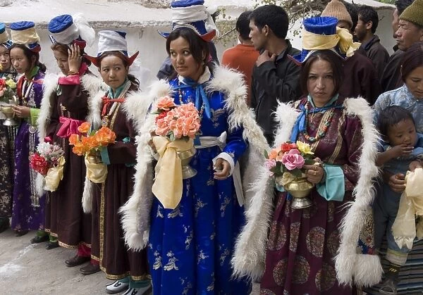 Group of young local women in full traditional costume