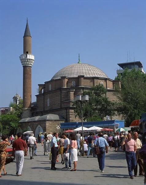 Groups of people outside the Bania Basi Mosque in Sofia, Bulgaria, Europe