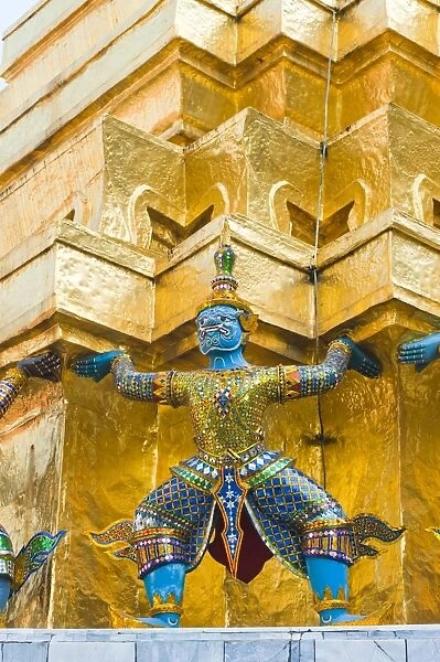 Guardian statues supporting a golden chedi, Grand Palace, Bangkok, Thailand, Southeast Asia, Asia