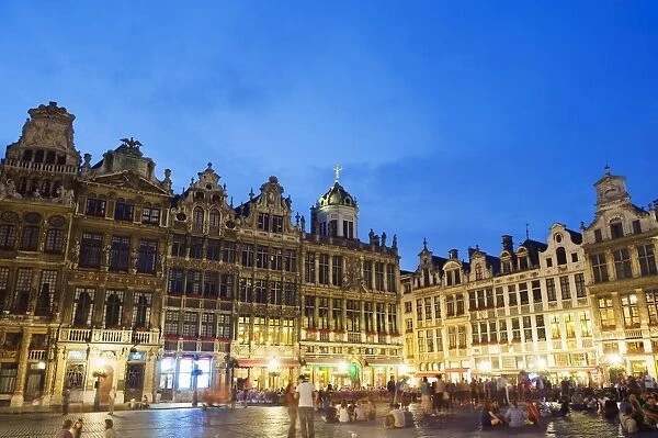 Guildhalls in the Grand Place illuminated at night, UNESCO World Heritage Site