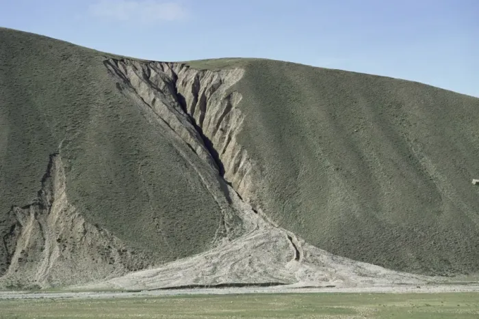 Framed Print : Gully erosion and alluvial fan on hillside 500m high, Nyainqentangla Mountains Framed Print : Gully erosion and alluvial fan on hillside 500m high, Nyainqentangla Mountains