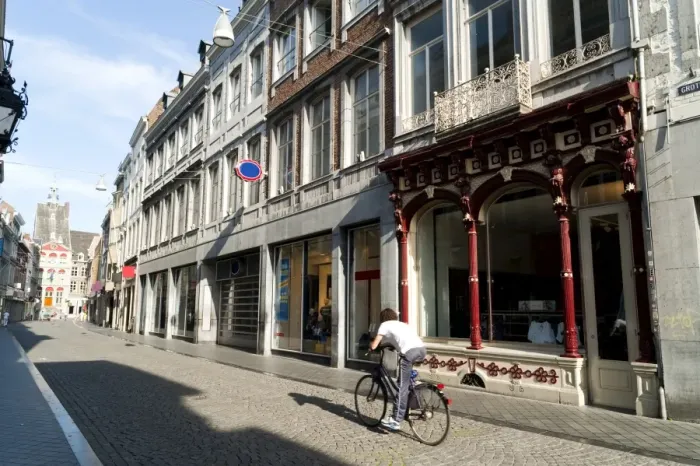 Framed Print : Guy riding bicycle in Grote Staat, the main commercial street, Mstricht