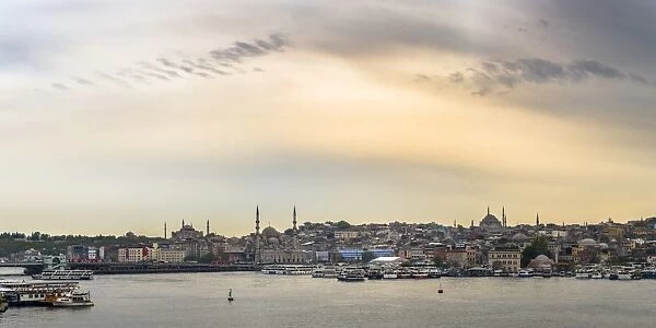 Hagia Sophia and New Mosque seen across Golden Horn at sunset, Istanbul, Turkey, Europe