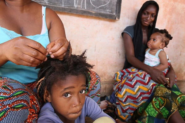 Hairdresser at home, Lome, Togo, West Africa, Africa