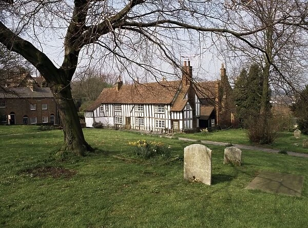 Half timbered cottages in the church graveyard at Old Hatfield, Hertfordshire