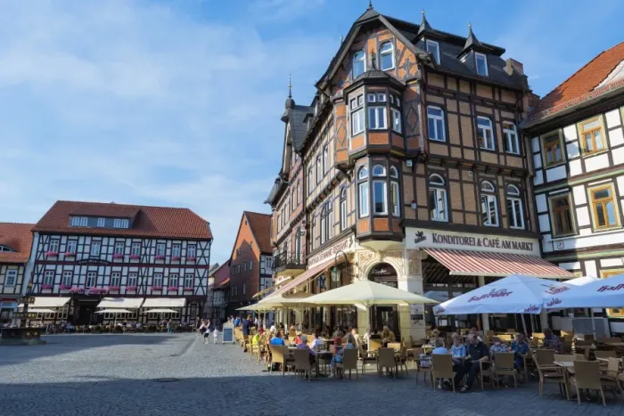 Framed Print : Half-timbered houses and cafe on the market square, Wernigerode, Harz, Saxony-Anhalt Framed Print : Half-timbered houses and cafe on the market square, Wernigerode, Harz, Saxony-Anhalt