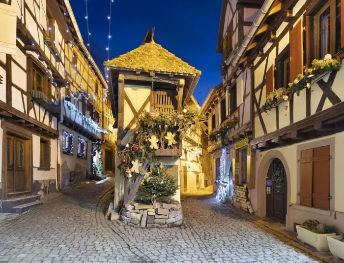 Framed Print : Half-timbered houses along Rue du Rempart Sud lit up with Christmas decorations at night Framed Print : Half-timbered houses along Rue du Rempart Sud lit up with Christmas decorations at night