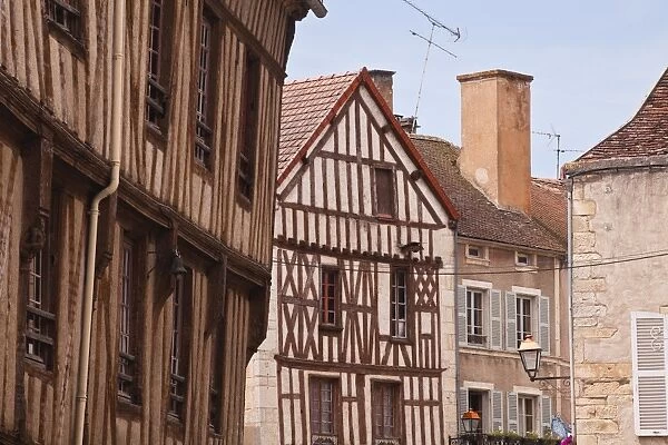 Half timbered houses in the village of Noyers sur Serein in Yonne, Burgundy, France, Europe