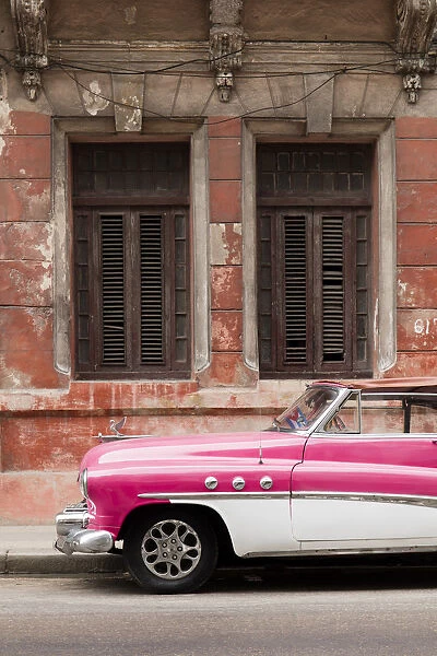 Front half of white and pink old vintage car, Havana, Cuba, West Indies, Caribbean