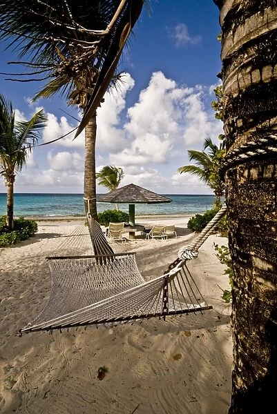 A hammock on an empty beach, Antigua, Leeward Islands, West Indies, Caribbean