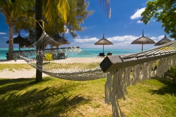 Hammock on the beach of the Beachcomber Le Paradis Hotel, Mauritius, Indian Ocean, Africa
