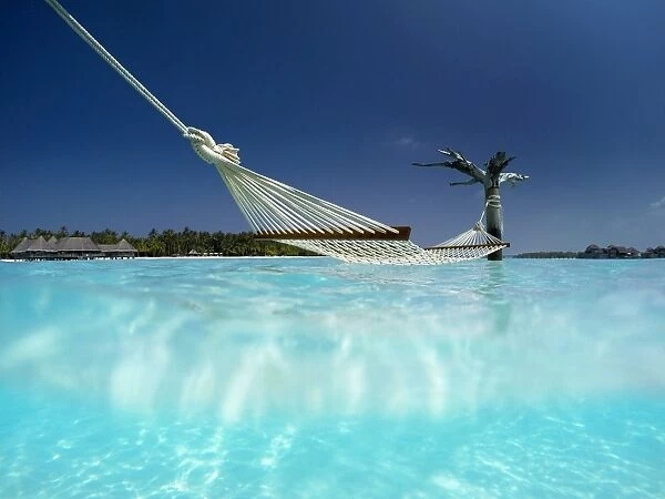 Hammock in the lagoon at Gili Lankanfushi Resort, Maldives, Indian Ocean, Asia