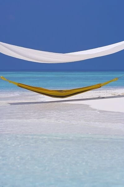 Hammock under shelter on tropical beach, Maldives, Indian Ocean, Asia
