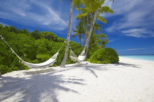 Hammock on empty tropical beach, Maldives, Indian Ocean, Asia
