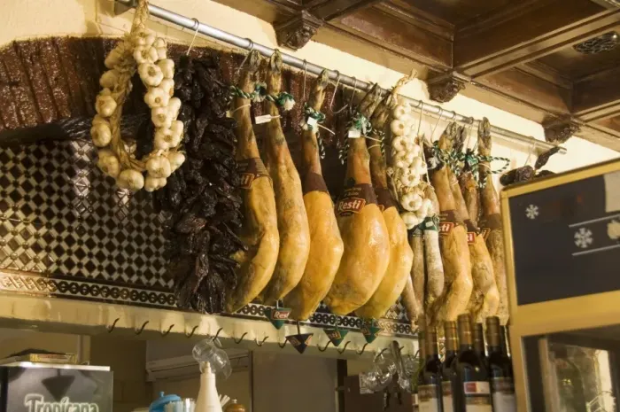 Framed Print : Hams hanging in tapas bar and restaurant Framed Print : Hams hanging in tapas bar and restaurant