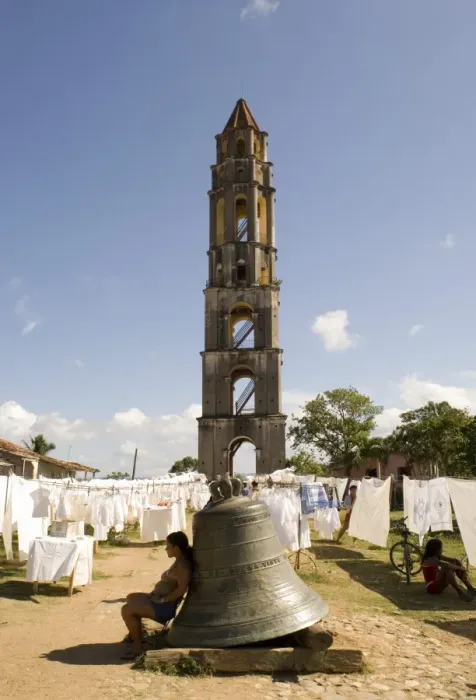 Framed Print : Hand crafted linens for sale beside the Manaca Iznaga Estate Tower and a bell which used to be rung to announce work hours for slaves on the plantation, Valle de los Ingenios, Eastern Cuba, Cuba, West Indies Framed Print : Hand crafted linens for sale beside the Manaca Iznaga Estate Tower and a bell which used to be rung to announce work hours for slaves on the plantation, Valle de los Ingenios, Eastern Cuba, Cuba, West Indies