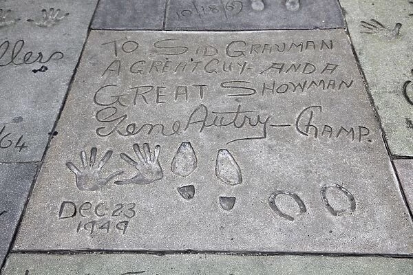Hand and foot prints of Gene Autry, Manns (Graumans) Chinese Movie Theatre, Hollywood Boulevard