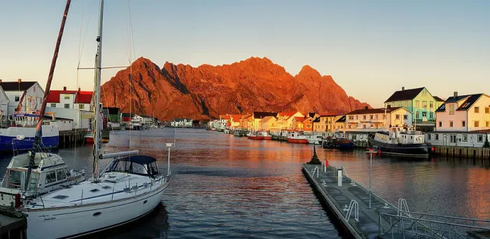 Framed Print : Harbor and village of Henningsvaer at sunset with mountains on background, Nordland county, Lofoten Islands, Norway, Scandinavia, Europe Framed Print : Harbor and village of Henningsvaer at sunset with mountains on background, Nordland county, Lofoten Islands, Norway, Scandinavia, Europe
