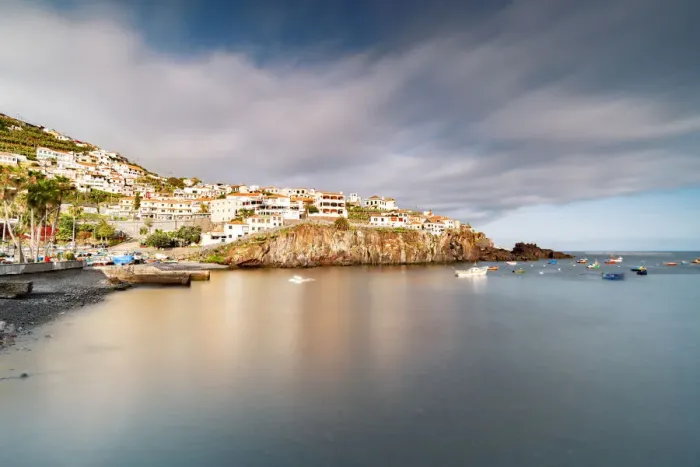 Framed Print : Harbor of the white town Camara de Lobos perched on cliffs, Madeira island, Portugal Framed Print : Harbor of the white town Camara de Lobos perched on cliffs, Madeira island, Portugal