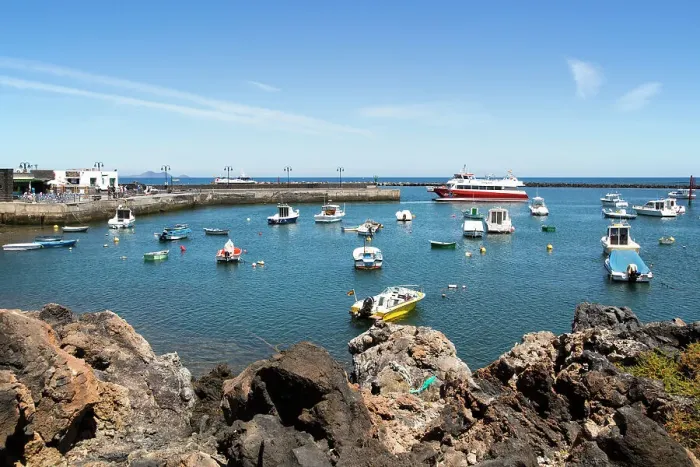 Framed Print : Harbour and ferry boat in the fishing village of Orzola, Lanzarote, Canary Islands, Spain, Atlantic, Europe Framed Print : Harbour and ferry boat in the fishing village of Orzola, Lanzarote, Canary Islands, Spain, Atlantic, Europe